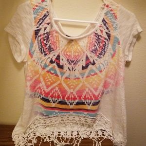 Tribal blouse with lace at the botto.